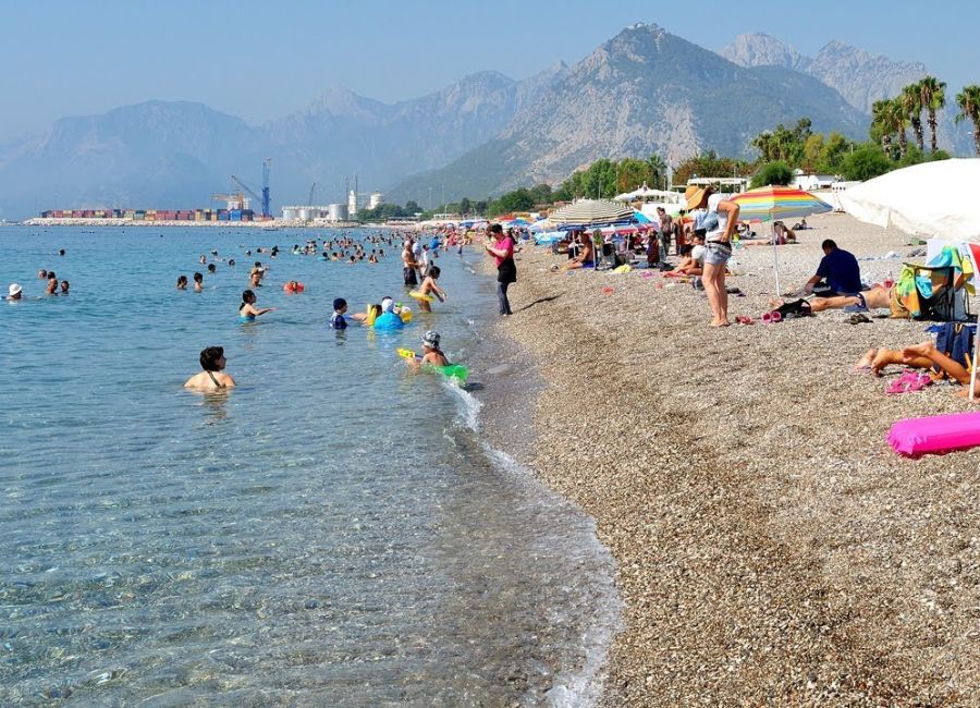Sunny Antalya beach with turquoise water during summer in Turkey