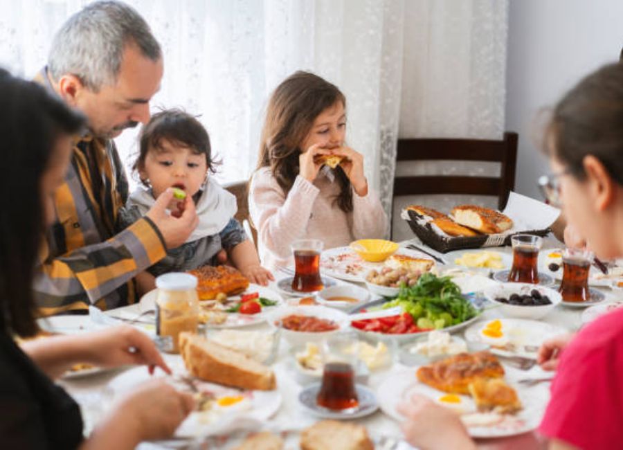 Traditional Turkish family sharing a meal together