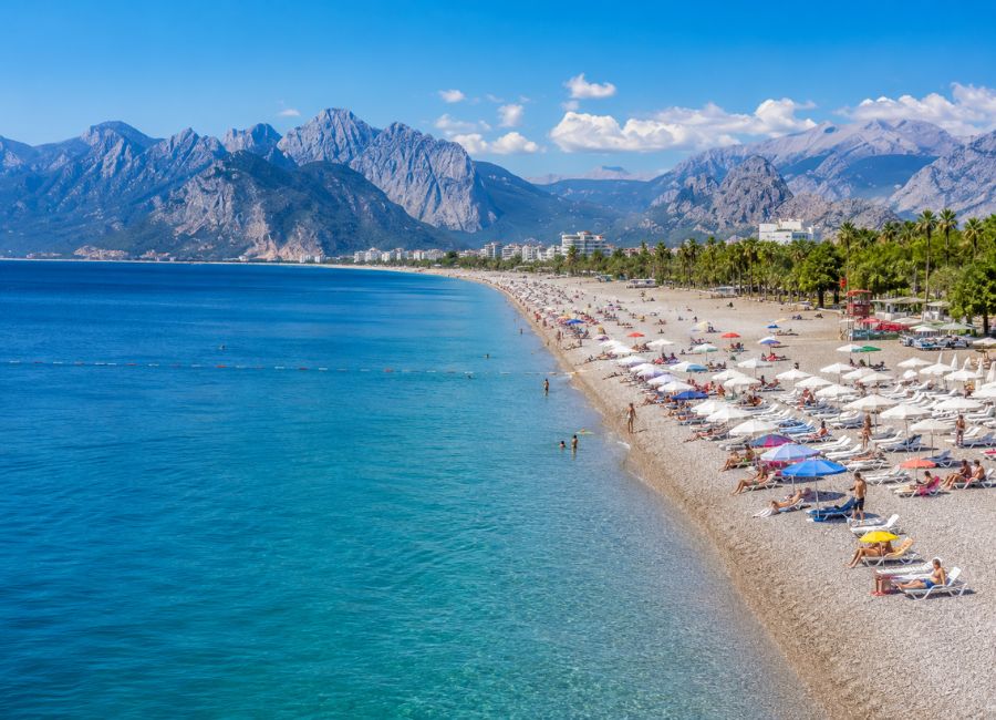 Konyaaltı Beach with turquoise sea and Taurus Mountains