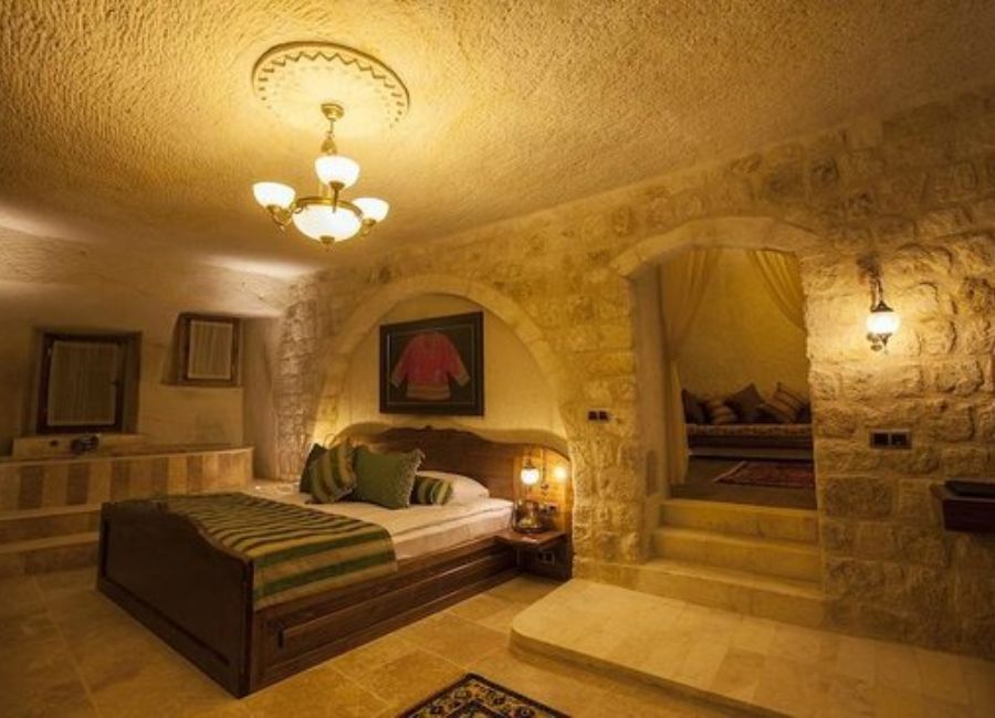 Traditional cave hotel in Cappadocia with stone interiors and scenic valley views