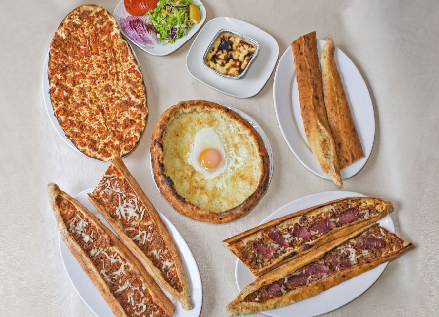 Turkish pide and lahmacun freshly baked in a stone oven