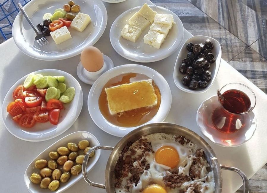 Traditional Turkish breakfast with tea cheese olives and bread