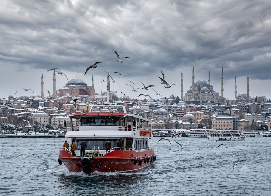 Bosphorus ferry crossing Istanbul during winter with scenic city views