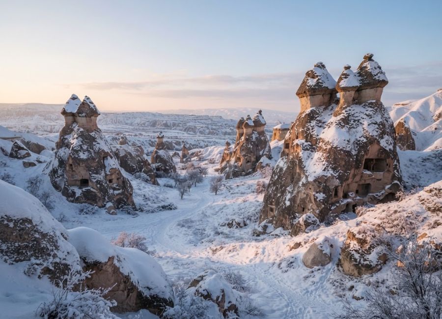 Snow-covered fairy chimneys in Paşabağ Valley Cappadocia
