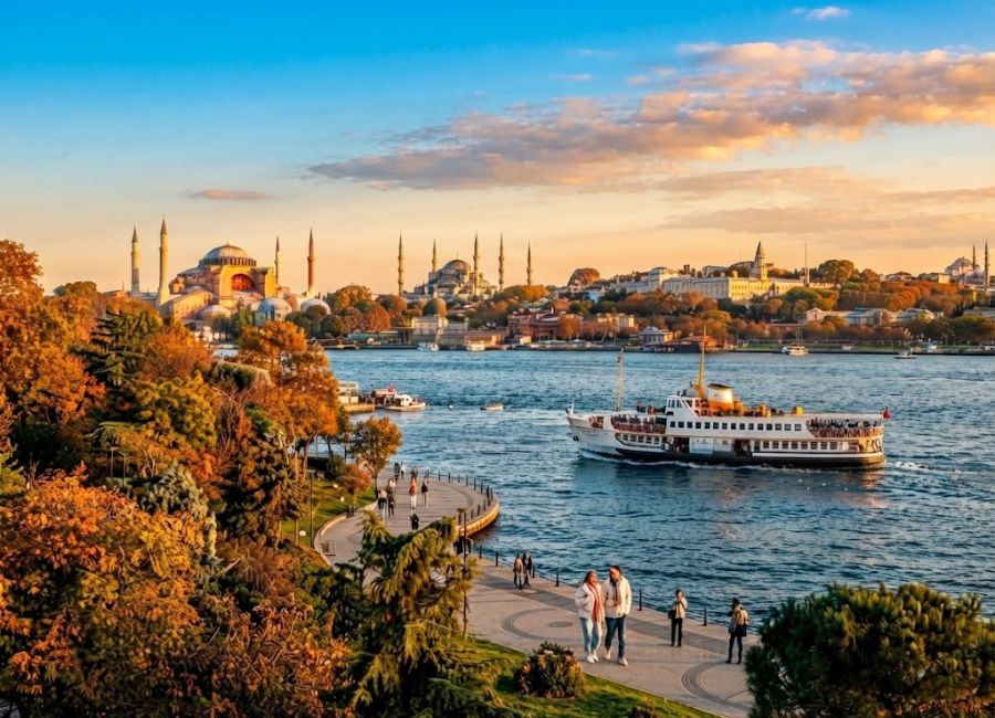 Istanbul in October with Bosphorus ferry and historic mosques