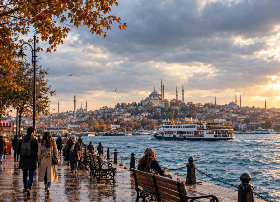 Istanbul weather in November with cloudy skies and Bosphorus ferry
